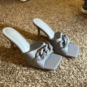 Never worn blue heels